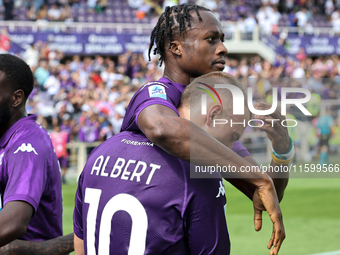 Albert Gudmundsson of ACF Fiorentina celebrates with teammates after scoring a goal during the Italian Serie A football match between ACF Fi...