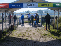 The riders enter the track, where they line up according to helmet colors during the FIM Long Track World Championship Final 5 at the Speed...