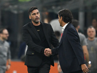 Paulo Fonseca of AC Milan and coach Simone Inzaghi of Inter FC during the Italian Serie A football match between Inter FC and AC Milan in Mi...