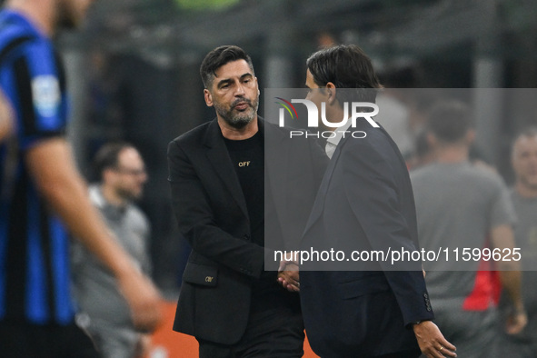 Paulo Fonseca of AC Milan and coach Simone Inzaghi of Inter FC during the Italian Serie A football match between Inter FC and AC Milan in Mi...