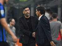 Paulo Fonseca of AC Milan and coach Simone Inzaghi of Inter FC during the Italian Serie A football match between Inter FC and AC Milan in Mi...