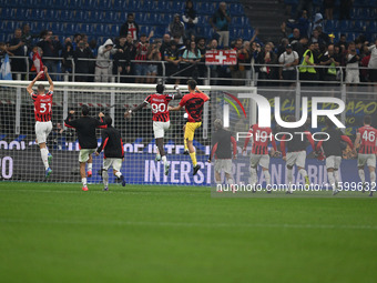 The team of AC Milan celebrates after victory during the Italian Serie A football match between Inter FC and AC Milan in Milan, Italy, on Se...