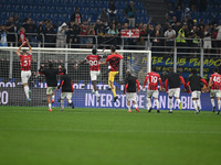 The team of AC Milan celebrates after victory during the Italian Serie A football match between Inter FC and AC Milan in Milan, Italy, on Se...