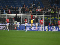 The team of AC Milan celebrates after victory during the Italian Serie A football match between Inter FC and AC Milan in Milan, Italy, on Se...