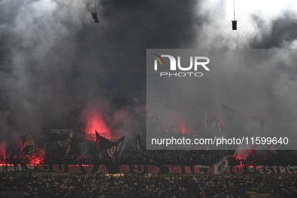 AC Milan supporters during the Italian Serie A football match between Inter FC and AC Milan in Milan, Italy, on September 22, 2024, at Giuse...