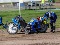 Kenny Van Eeckhout of Belgium tries to refit the chain on his machine in the Sidecar Support Class during the FIM Long Track World Champions...