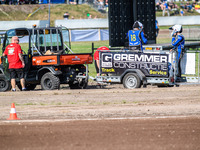 The SC18 crew is taken back to the pits on the recovery vehicle during the FIM Long Track World Championship Final 5 at the Speed Centre Rod...