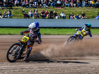 Zach Wajtknecht (109) of Great Britain in blue leads Mathias Tresarrieu (27) of France in green during the FIM Long Track World Championship...