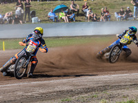 Jacob Bukhave (79) of Denmark in yellow leads Mathias Tresarrieu (27) of France in green during the FIM Long Track World Championship Final...