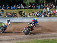 Kenneth Kruse Hansen (333) of Denmark in blue rides inside Martin Smolinski (84) of Germany in white, Hynek Stichauer (86) of Czech Republic...