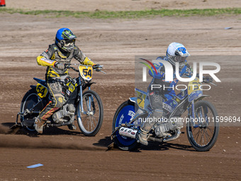 Chris Harris (37) of Great Britain in white leads Mika Meijer (54) of The Netherlands in blue during the FIM Long Track World Championship F...