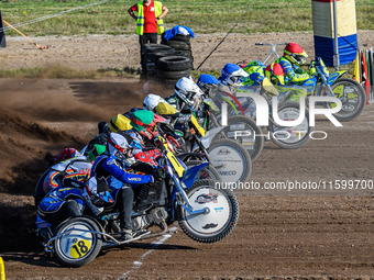 Sidecar Final: (L to R) Kenny Van Eeckhout & Axelle Cannaerts (18) of Belgium in Black & White, Clement & Romain Furet (32) of France in Gre...