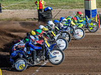 Sidecar Final: (L to R) Kenny Van Eeckhout & Axelle Cannaerts (18) of Belgium in Black & White, Clement & Romain Furet (32) of France in Gre...