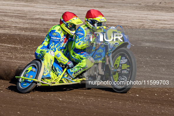 Mitch Goddard and Paul Smith (9) of Great Britain lead the sidecar final in the Sidecar Support Class during the FIM Long Track World Champi...