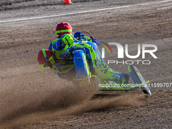 Mitch Goddard and Paul Smith (9) of Great Britain lead the sidecar final in the Sidecar Support Class during the FIM Long Track World Champi...