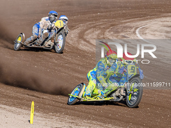 Mitch Goddard and Paul Smith (9) of Great Britain in red lead Wilfred Detz and Britget Portijk (1) of The Netherlands in blue in the Sidecar...