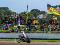 Martin Smolinski (84) of Germany rides past his fans after his heat during the FIM Long Track World Championship Final 5 at the Speed Centre...