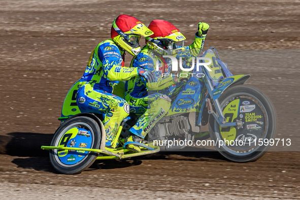 Mitch Goddard and Paul Smith (9) of Great Britain celebrate their win in the Sidecar Support Class during the FIM Long Track World Champions...