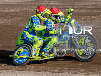 Mitch Goddard and Paul Smith (9) of Great Britain celebrate their win in the Sidecar Support Class during the FIM Long Track World Champions...