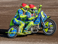 Mitch Goddard and Paul Smith (9) of Great Britain celebrate their win in the Sidecar Support Class during the FIM Long Track World Champions...