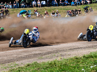 Wilfred Detz and Britget Portijk (1) of The Netherlands in red lead Jeremy Malpeyre and Dylan Bouillard (21) of France in green, Mike Freder...