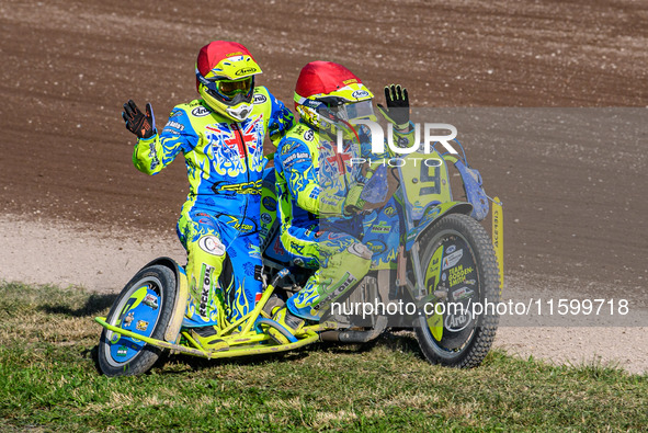 Mitch Goddard and Paul Smith (9) of Great Britain take their lap of honor in the Sidecar Support Class during the FIM Long Track World Champ...