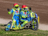 Mitch Goddard and Paul Smith (9) of Great Britain take their lap of honor in the Sidecar Support Class during the FIM Long Track World Champ...