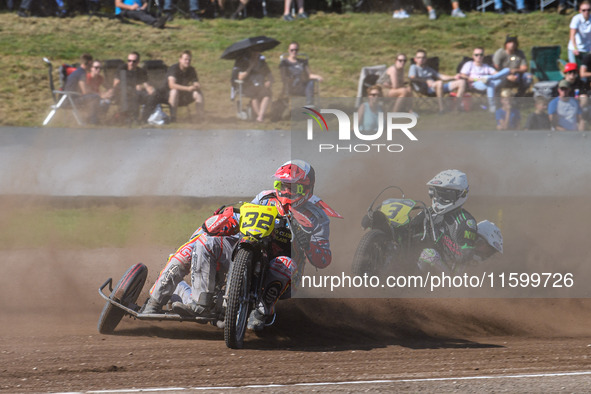 Clement & Romain Furet (32) of France in black and white lead Josh & Scott Goodwin (3) of Great Britain in white during the FIM Long Track W...