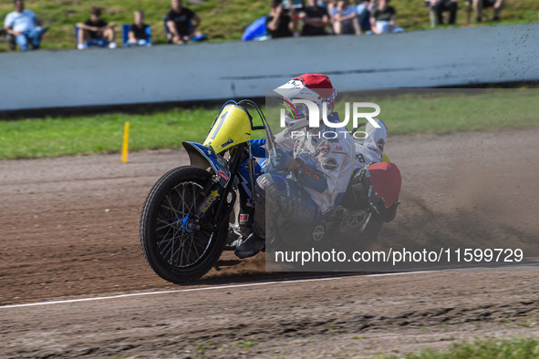 Wilfred Detz and Britget Portijk of the Netherlands compete during the FIM Long Track World Championship Final 5 at the Speed Centre Roden i...