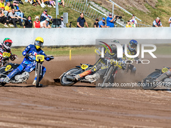 Zach Wajtknecht (109) of Great Britain in red rides inside Mika Meijer (54) of The Netherlands in white and Jordan Dubernard (85) of France...