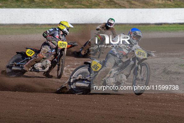 Hynek Stichauer (86) of the Czech Republic in blue leads Zach Wajtknecht (109) of Great Britain in yellow and Henri Ahlbom (97) of Finland i...