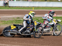 Henri Ahlbom (97) of Finland in Yellow rides outside Andrew Appleton (141) of Great Britain in Red during the FIM Long Track World Champions...