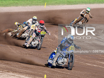 Chris Harris (37) of Great Britain in white leads Kenneth Kruse Hansen (333) of Denmark in red and Andrew Appleton (141) of Great Britain in...