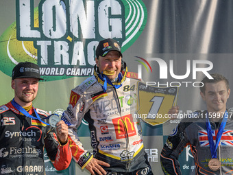 World Championship Top 3: (L to R) Lukas Fienhage (125) of Germany (2nd), Martin Smolinski (84) of Germany (World Champion), Zach Wajtknecht...