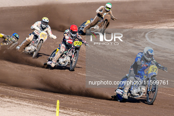 Chris Harris (37) of Great Britain in white leads Kenneth Kruse Hansen (333) of Denmark in red and Andrew Appleton (141) of Great Britain in...