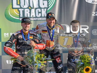 World Championship Top 3: (L to R) Lukas Fienhage (125) of Germany (2nd), Martin Smolinski (84) of Germany (World Champion), Zach Wajtknecht...