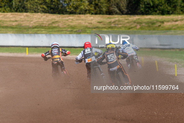 Henry van der Steen (15) of The Netherlands in Yellow chases Hynek Stichauer (86) of Czech Republic in Red, Lukas Fienhage (125) of Germany...