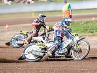 Martin Smolinski (84) of Germany in blue leads Lukas Fienhage (125) of Germany in white during the FIM Long Track World Championship Final 5...