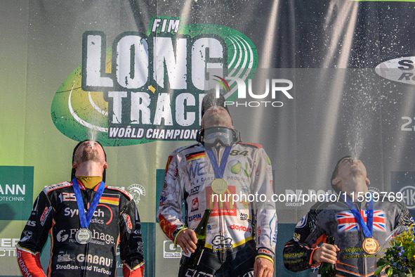 The top three participate in the fountain during the FIM Long Track World Championship Final 5 at the Speed Centre Roden in Roden, Netherlan...