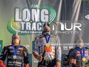 The top three participate in the fountain during the FIM Long Track World Championship Final 5 at the Speed Centre Roden in Roden, Netherlan...