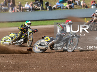 Hynek Stichauer (86) of the Czech Republic in red leads Tero Aarnio (44) of Finland in green during the FIM Long Track World Championship Fi...