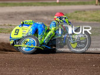 Mitch Goddard and Paul Smith (9) of Great Britain participate in the Sidecar Support Class during the FIM Long Track World Championship Fina...