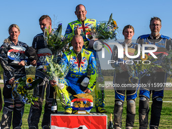 Sidecar top 3: (L to R) Mike Frederiksen & Jette Maersk (6) of Denmark (second), Mitch Goddard & Paul Smith (9) of Great Britain (winners),...