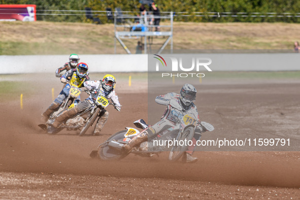 Andrew Appleton (141) of Great Britain in white leads Hynek Stichauer (86) of the Czech Republic in yellow, Mathias Tresarrieu (27) of Franc...