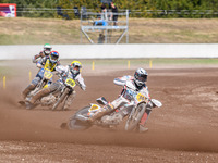 Andrew Appleton (141) of Great Britain in white leads Hynek Stichauer (86) of the Czech Republic in yellow, Mathias Tresarrieu (27) of Franc...