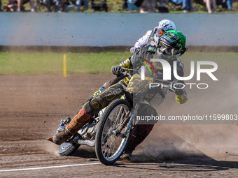 Mika Meijer (54) of The Netherlands in green leads Hynek Stichauer (86) of Czech Republic in white during the FIM Long Track World Champions...