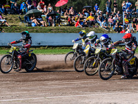 Lukas Fienhage (125) of Germany in green leads the pack of riders during the FIM Long Track World Championship Final 5 at the Speed Centre R...