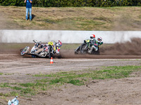 Wilfred Detz and Britget Portijk of the Netherlands come to grief in the Sidecar Support Class during the FIM Long Track World Championship...