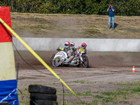 Wilfred Detz and Britget Portijk of the Netherlands come to grief in the Sidecar Support Class during the FIM Long Track World Championship...