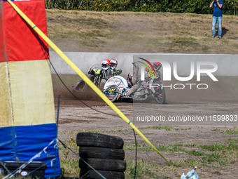 Wilfred Detz and Britget Portijk of the Netherlands come to grief in the Sidecar Support Class during the FIM Long Track World Championship...